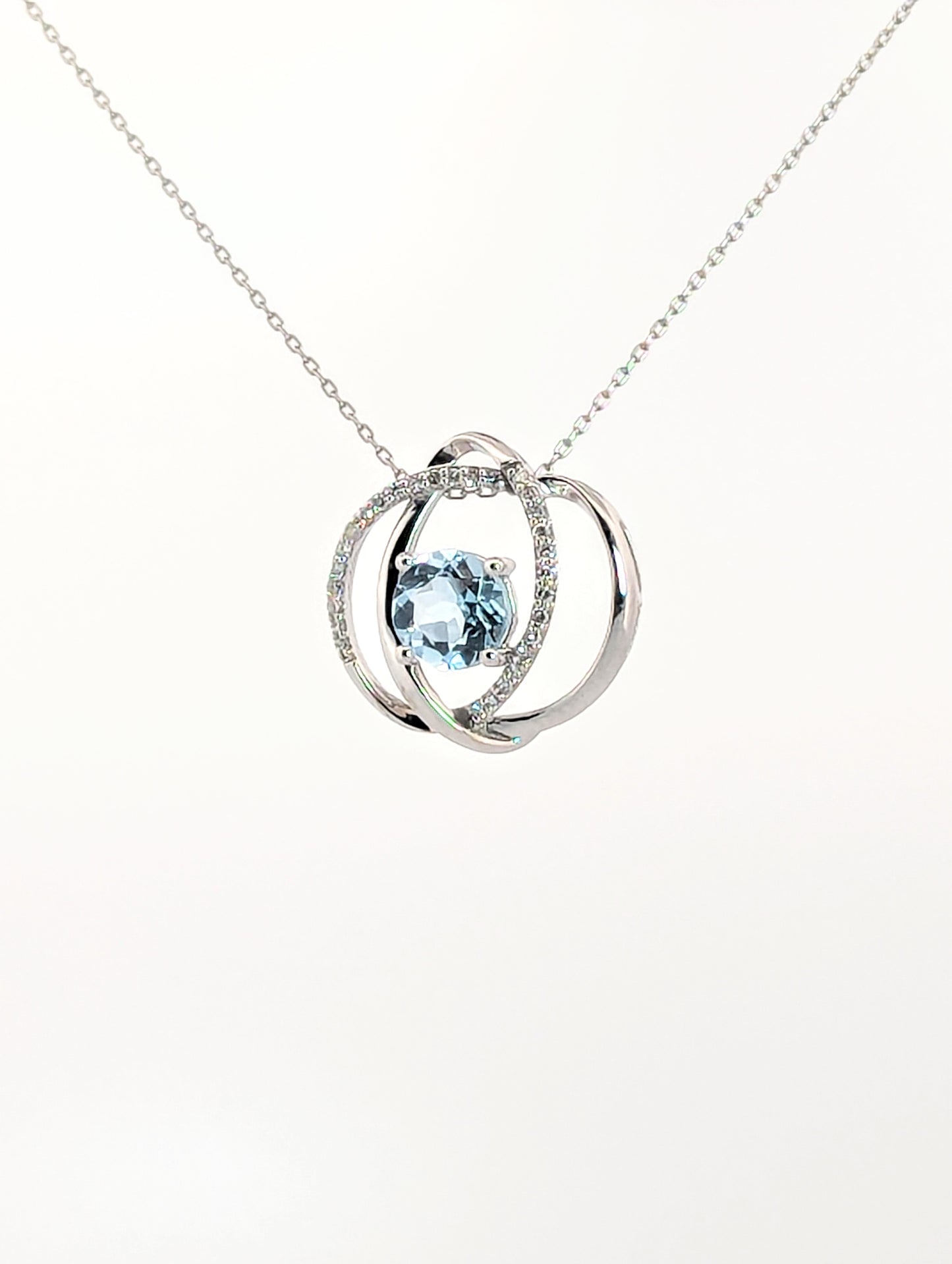 Entwined Topaz Circle Pendant