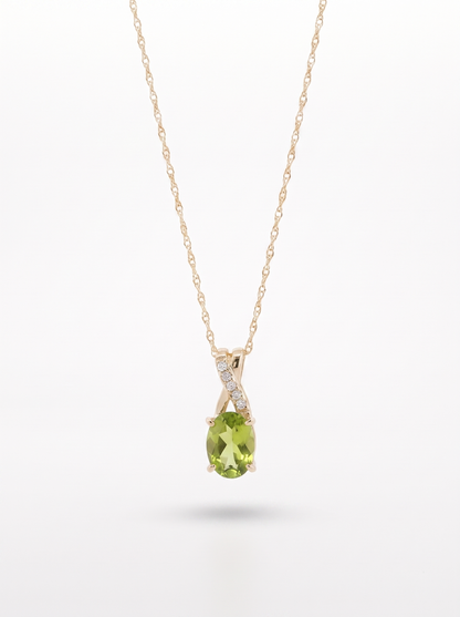 Peridot and diamond pendant necklace in 10K yellow gold — front view, white background